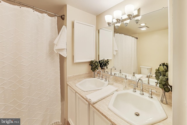 3101 New Mexico Ave NW Unit 847, Washington, DC 20016 - bathroom featuring double vanity, curtained shower, and a sink