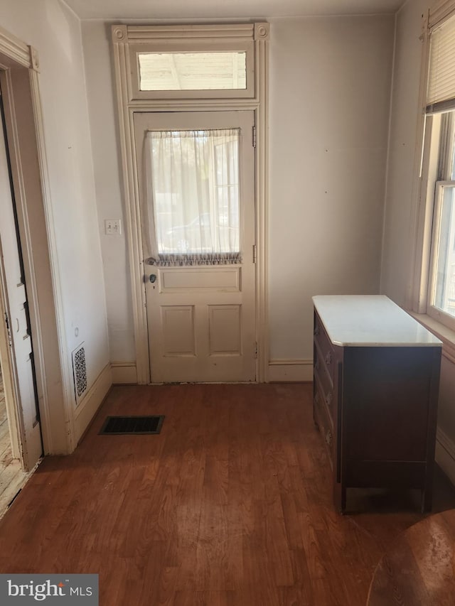 entryway with visible vents and wood finished floors