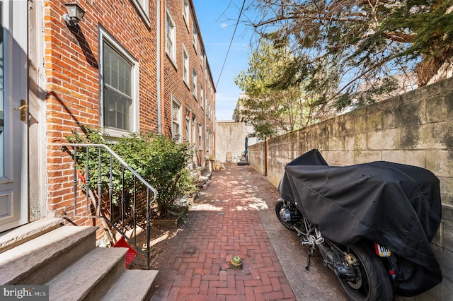 view of patio / terrace with entry steps, fence, and area for grilling