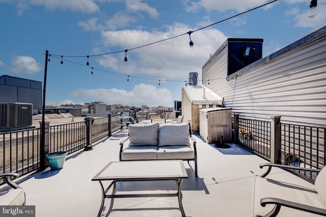 view of patio featuring an outdoor living space and central air condition unit