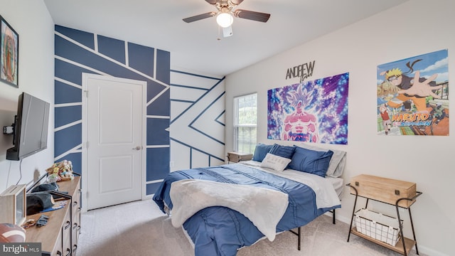 bedroom featuring carpet floors and a ceiling fan