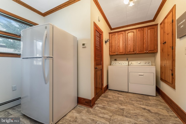 23 Swan St, Lambertville, NJ 08530 - laundry room with a baseboard heating unit, baseboards, washer and dryer, cabinet space, and crown molding