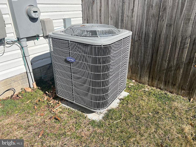 exterior details with central air condition unit and electric meter