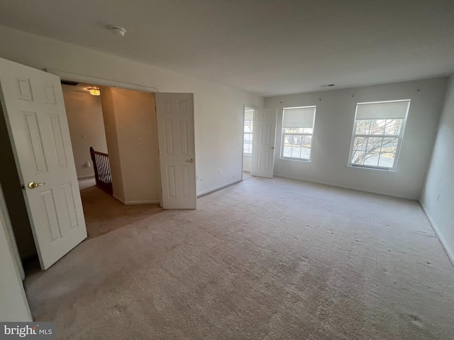 empty room featuring carpet floors