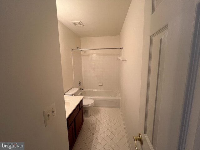 bathroom featuring shower / bath combination, visible vents, toilet, vanity, and tile patterned floors