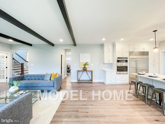 living room with baseboards, stairway, beamed ceiling, light wood-style floors, and recessed lighting