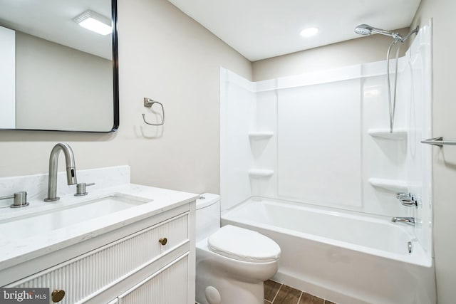 bathroom featuring  shower combination, wood finished floors, vanity, and toilet