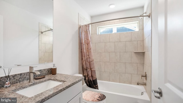 full bath with vanity, shower / bath combination with curtain, and toilet