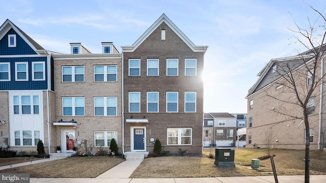 multi unit property featuring brick siding