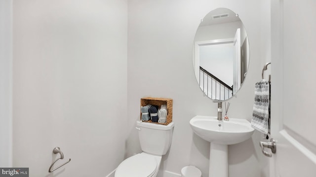 bathroom featuring toilet