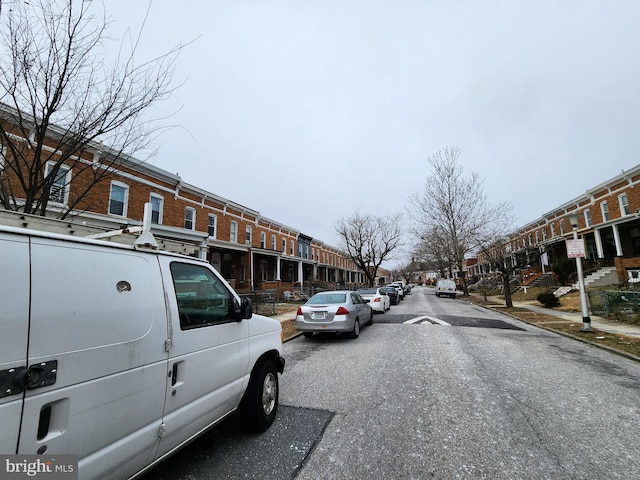 view of street featuring curbs and sidewalks