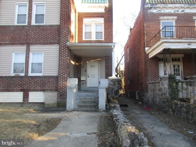 view of front of property with brick siding