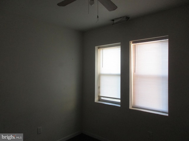 spare room featuring a ceiling fan