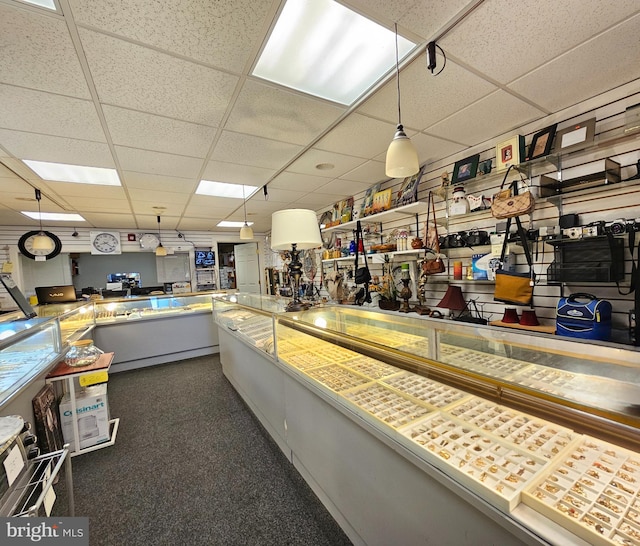 miscellaneous room with a drop ceiling