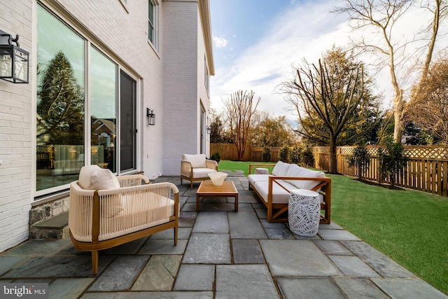 view of patio / terrace featuring outdoor lounge area and a fenced backyard