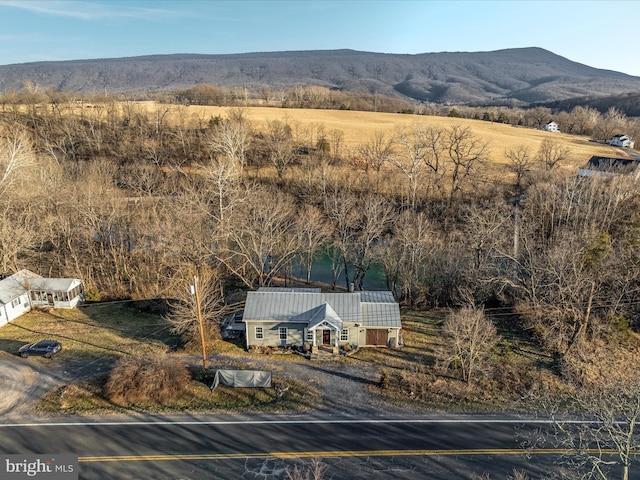 aerial view featuring a mountain view and a rural view