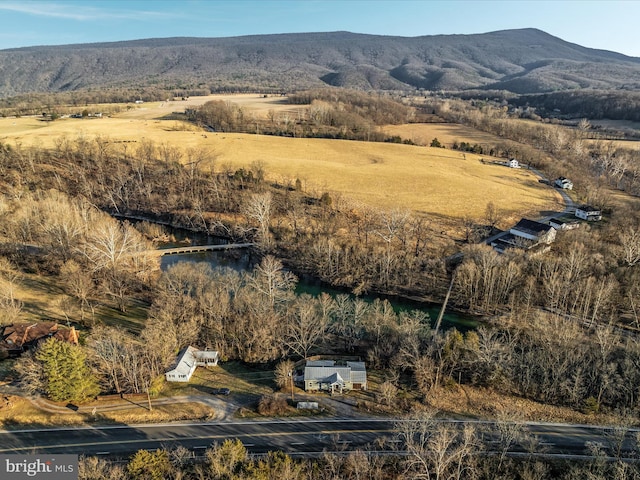 birds eye view of property featuring a rural view and a mountain view