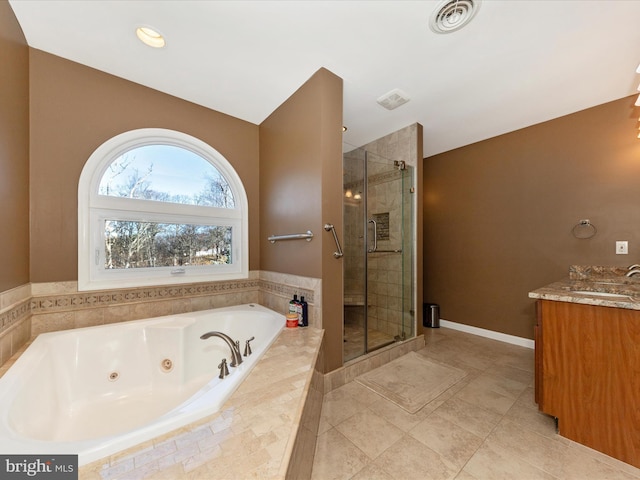 full bath with visible vents, baseboards, a jetted tub, and a shower stall