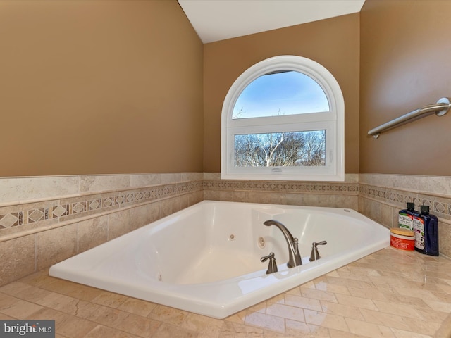 bathroom featuring a whirlpool tub