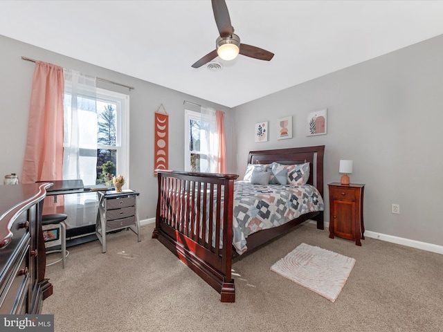 bedroom featuring baseboards, carpet, and a ceiling fan