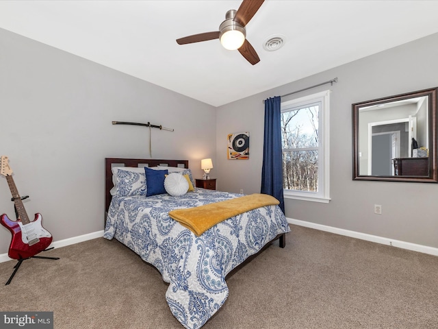 bedroom featuring vaulted ceiling, carpet, visible vents, and baseboards