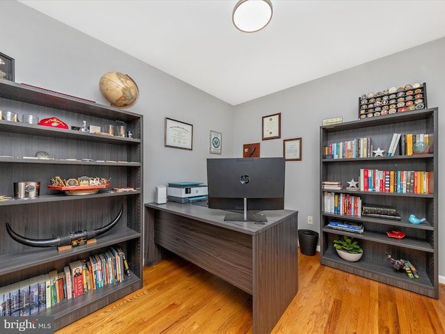 office space featuring light wood-style flooring