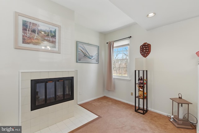 living area with recessed lighting, a fireplace, baseboards, and carpet floors