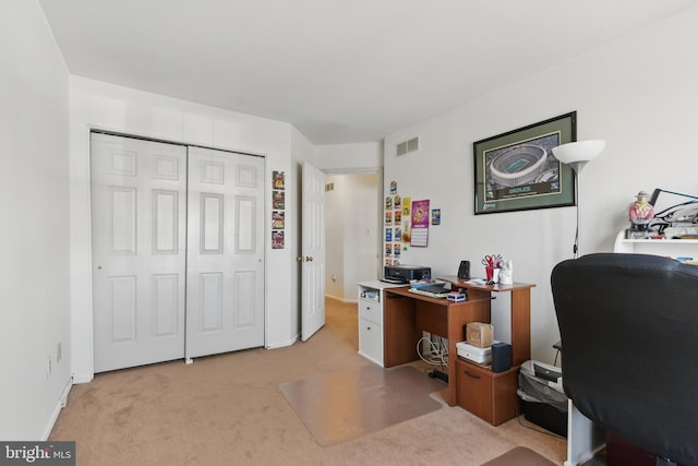 home office featuring visible vents and light colored carpet