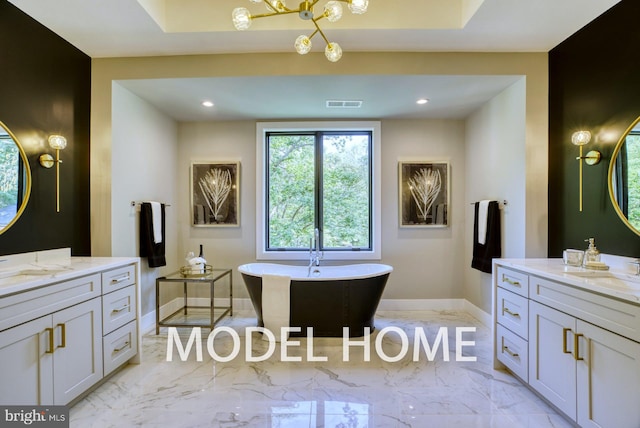 bathroom featuring recessed lighting, visible vents, baseboards, marble finish floor, and a soaking tub