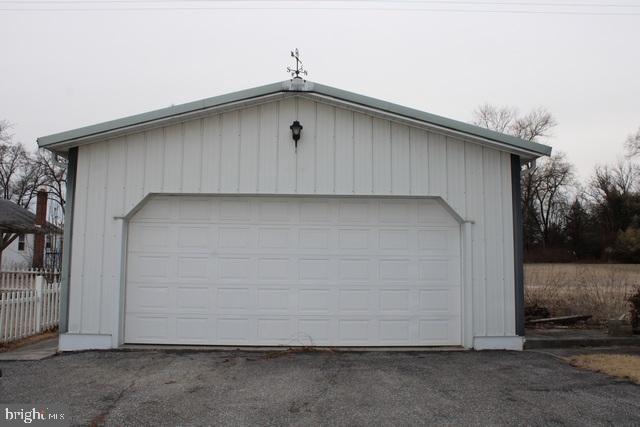 detached garage with fence