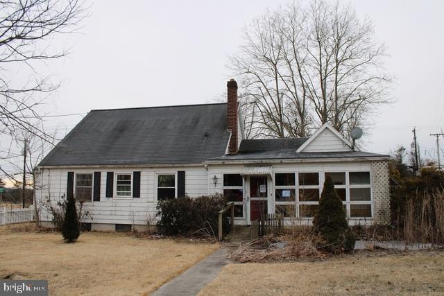 view of front of house with a chimney