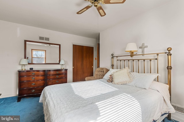 carpeted bedroom featuring a ceiling fan, baseboards, visible vents, and a closet