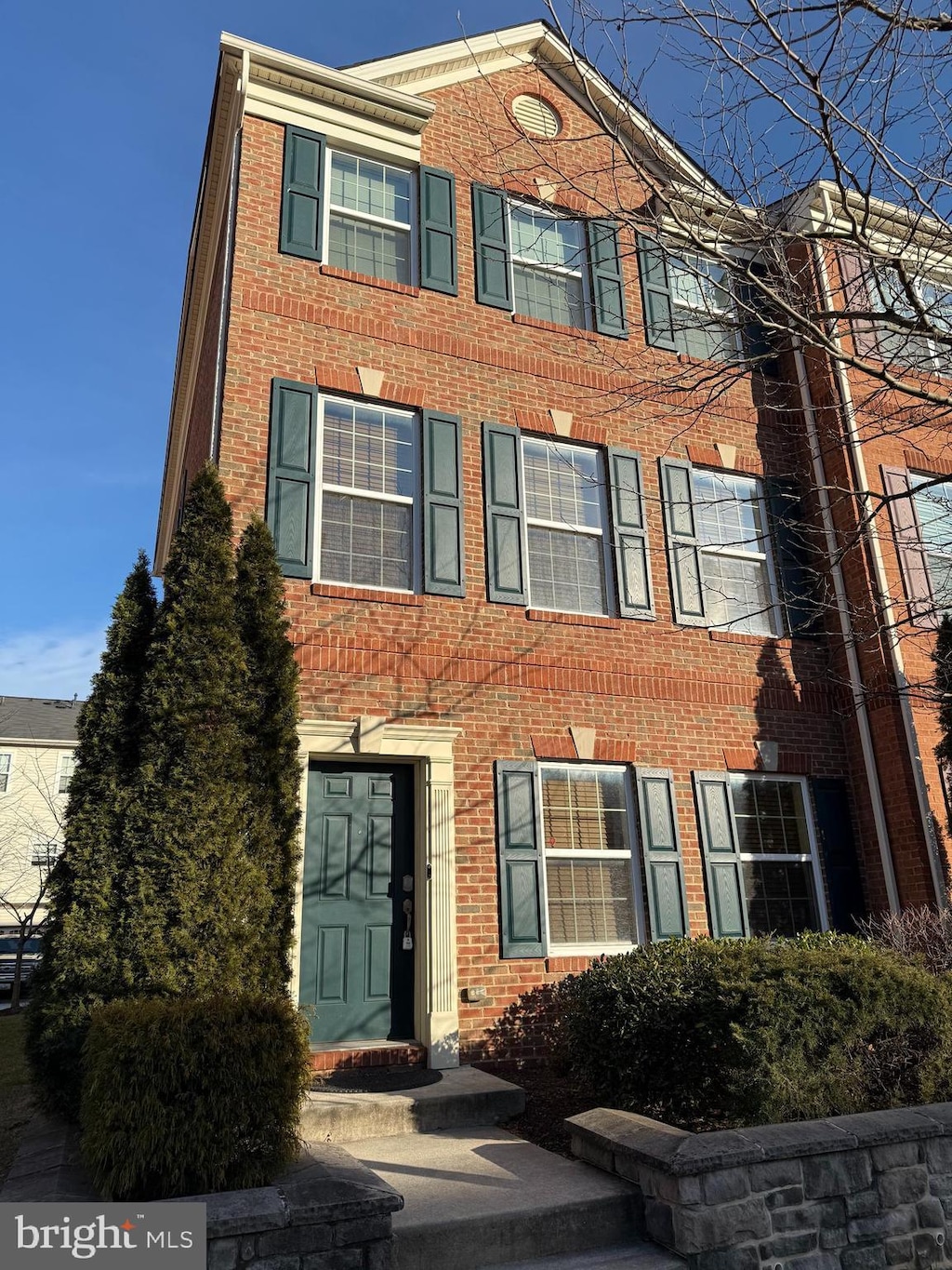 view of front of property with brick siding