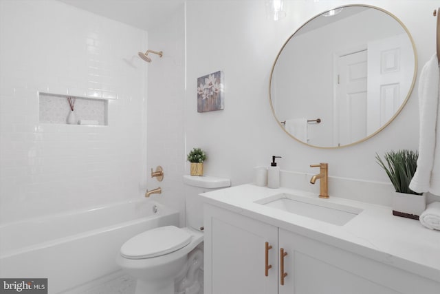 bathroom featuring vanity, toilet, and shower / bath combination