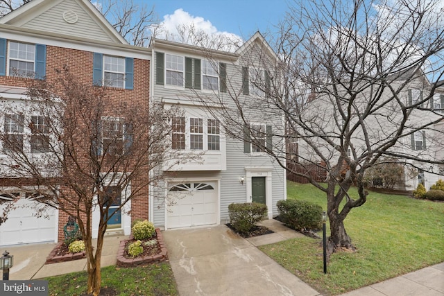 multi unit property featuring brick siding, an attached garage, concrete driveway, and a front lawn