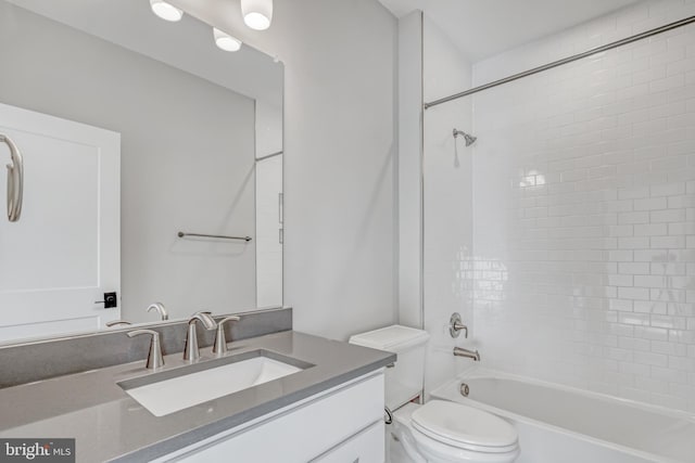 full bathroom featuring shower / bathing tub combination, vanity, and toilet