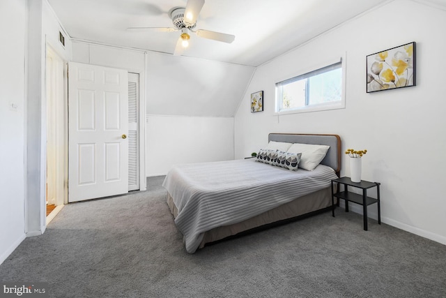 bedroom featuring carpet floors, visible vents, a ceiling fan, vaulted ceiling, and baseboards