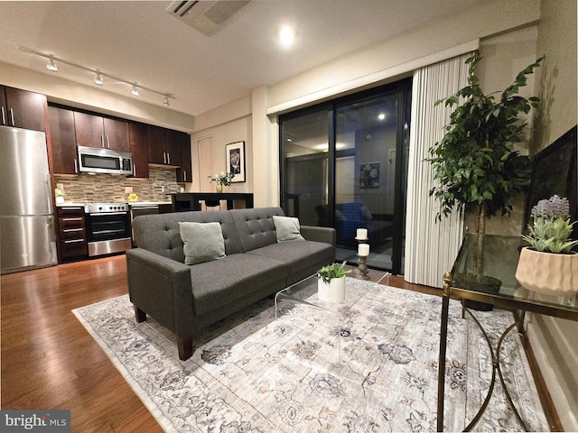 living room with dark wood-style floors