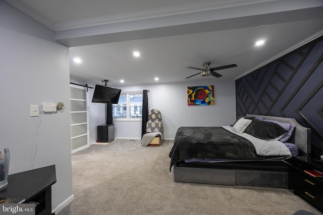 carpeted bedroom featuring recessed lighting, crown molding, baseboards, and a barn door