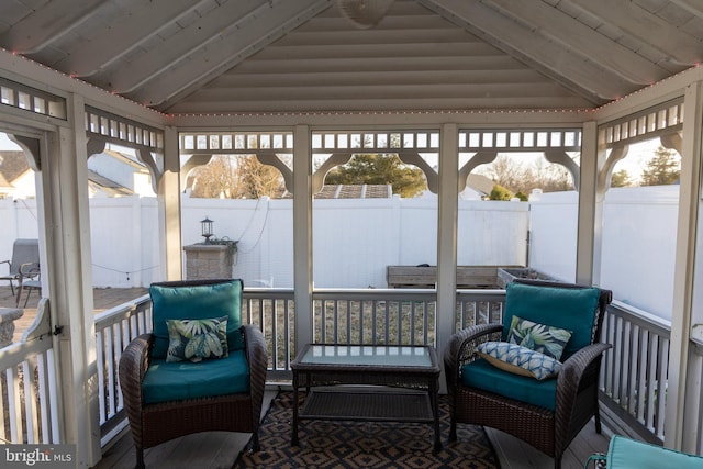 sunroom with vaulted ceiling