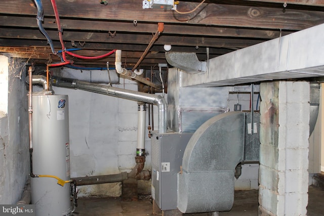 utility room featuring water heater