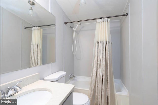 bathroom with vanity, toilet, and shower / bathtub combination with curtain