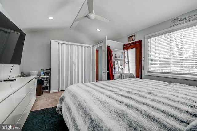 bedroom with dark carpet, vaulted ceiling, a ceiling fan, and recessed lighting