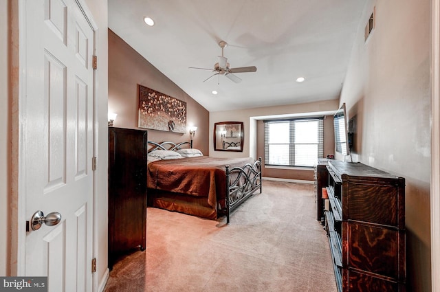 carpeted bedroom featuring lofted ceiling, ceiling fan, visible vents, and recessed lighting