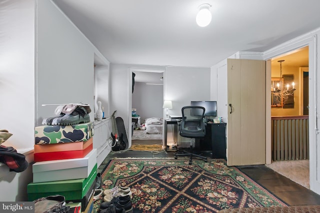 office area featuring an inviting chandelier