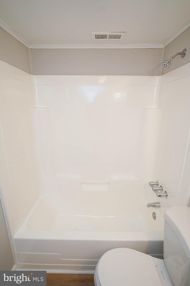 full bathroom featuring visible vents, toilet, and shower / bathtub combination