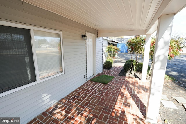 view of patio featuring a porch