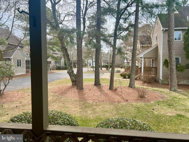 view of yard featuring a residential view