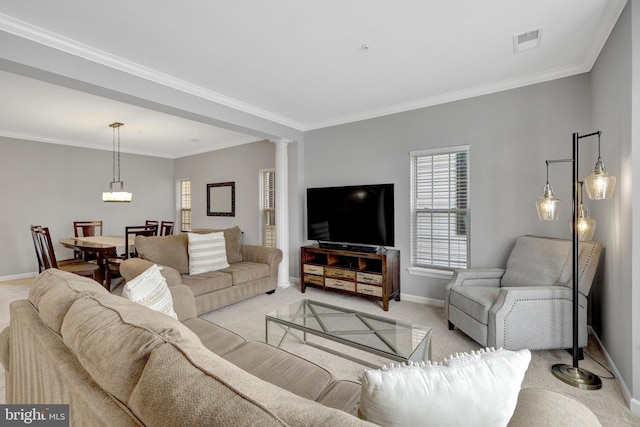 living area with visible vents, light colored carpet, baseboards, and ornamental molding