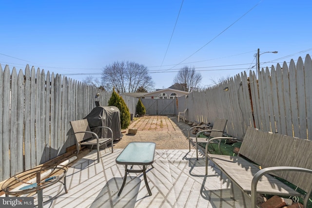 view of patio / terrace featuring area for grilling and a fenced backyard